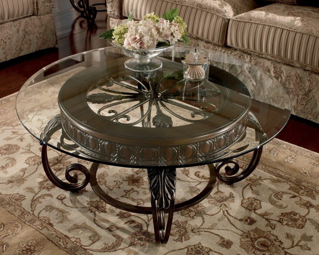 A tea  table Furniture in UAE manufacturer by Glass, wood and metal 